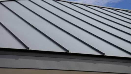 Gray Seam Metal Roof on sky background